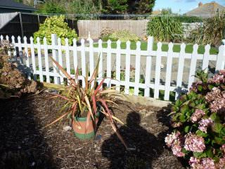 Picket Fence After Application of Bedec Barn Paint